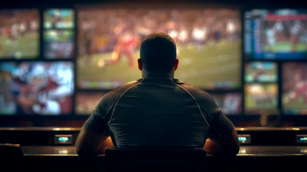 A stylish woman beside vibrant slot machines displaying glowing sevens, showcasing the variety of top slots at SOUL777.
